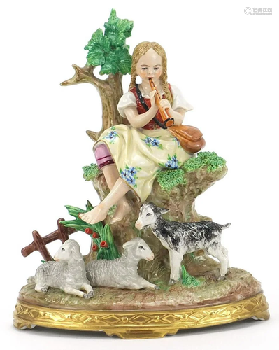 German porcelain figurine of a female playing a flute