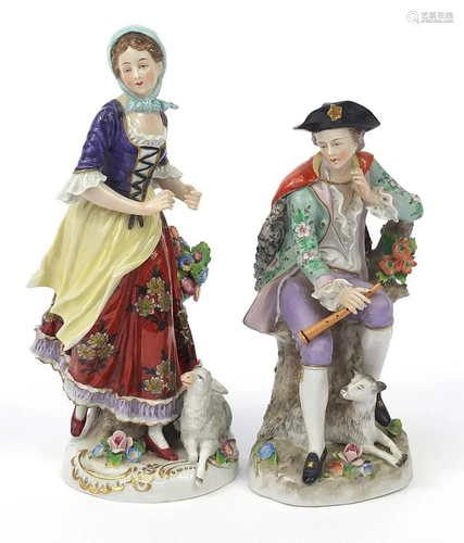 Pair of German porcelain figures with sheep, the