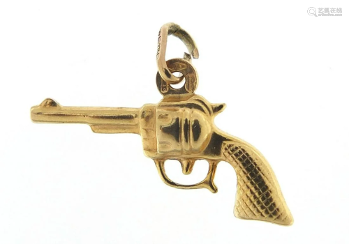 9ct gold revolver pistol charm, 2.4cm in length, 1.1g