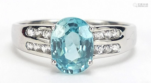 9ct white gold blue topaz and cubic zirconia ring, size