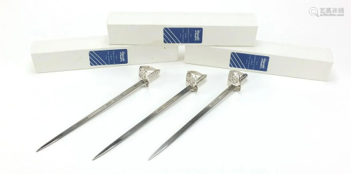Three Wilkinson Sword letter openers with boxes, each