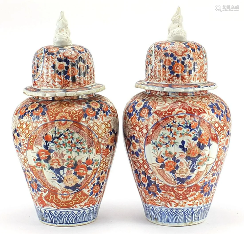 Large pair of Japanese Imari lidded porcelain vases,