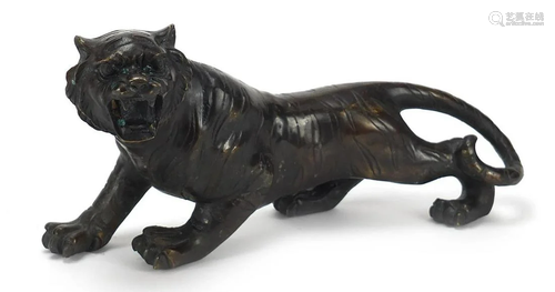 Large Japanese patinated bronze tiger, 31cm in length