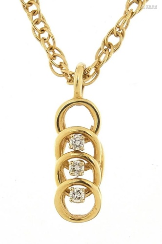 9ct gold diamond three stone pendant on a 9ct gold