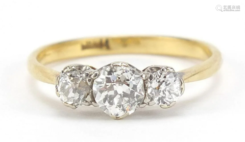 18ct gold diamond trilogy ring, the central diamond