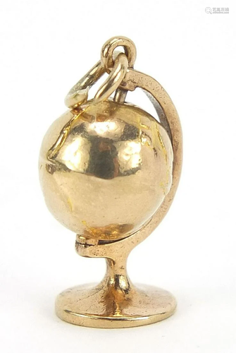 9ct gold rotating globe charm, 1.7cm high, 1.7g