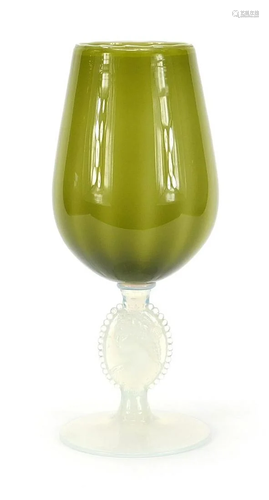 Large green goblet vase with opalescent figural stem,