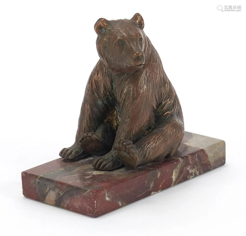 Art Deco patinated bear design desk weight raised on a