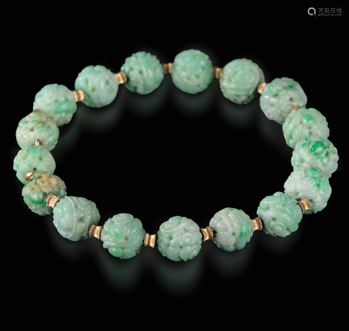 A carved jadeite necklace, China, early 1900s