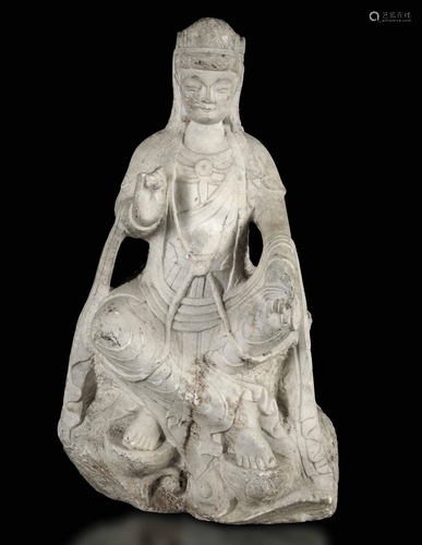 A carved stone deity, China, Wei Dynasty