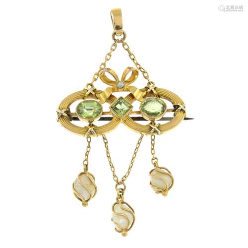 An early 20th century 9ct gold peridot and baroque pearl pen...