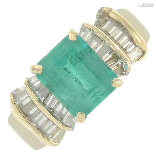 An emerald and baguette-cut diamond dress ring.Emerald calcu...