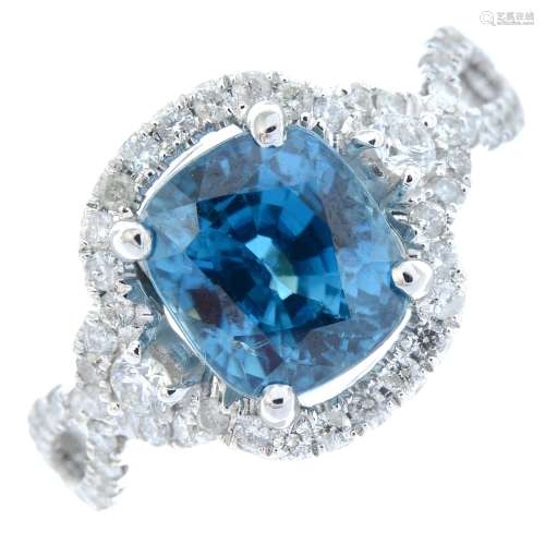 A blue zircon and brilliant-cut diamond ring.Zircon calculat...