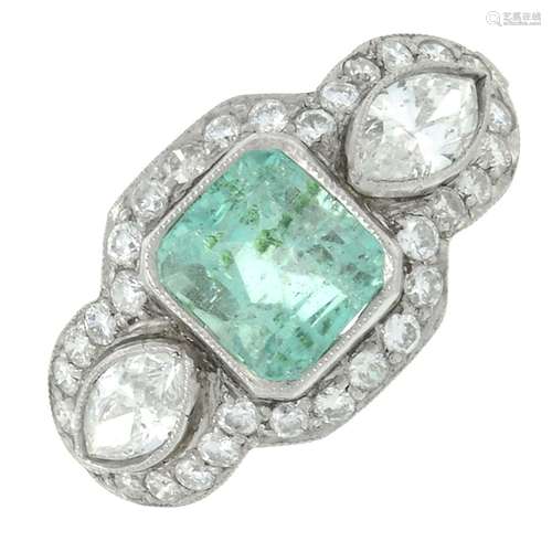 An emerald dress ring, with marquise-shape diamond sides, wi...