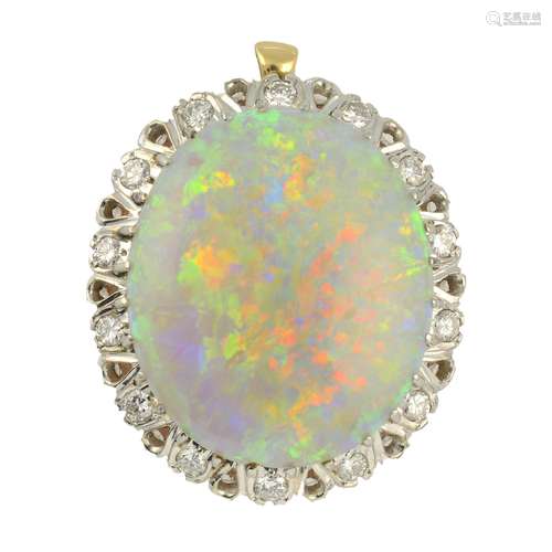 An opal and diamond cluster pendant.