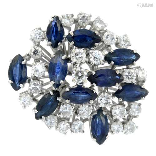 A sapphire and brilliant-cut diamond dress ring.Estimated to...