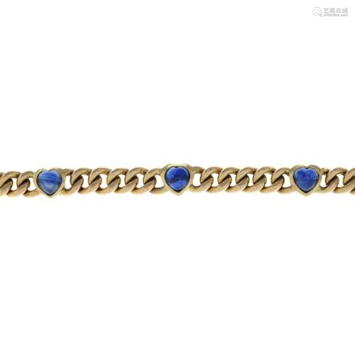 A sapphire curb-link chain bracelet.Stamped 750.Length 18cms...