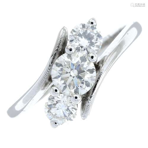 A brilliant-cut diamond three-stone ring.Estimated total dia...