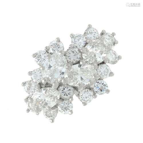 A vari-cut diamond cluster dress ring.