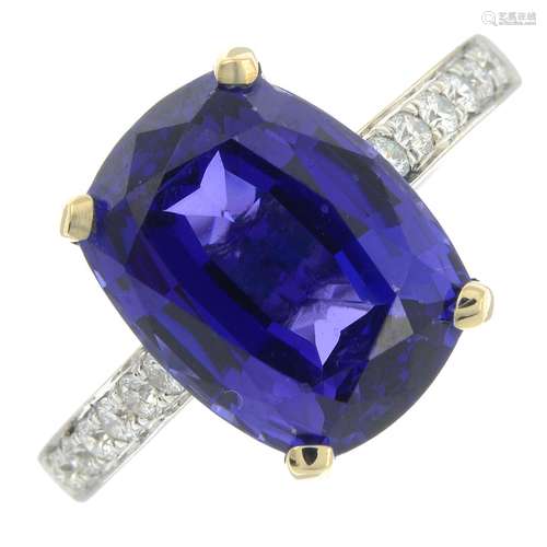 An 18ct gold tanzanite ring, with brilliant-cut diamond side...