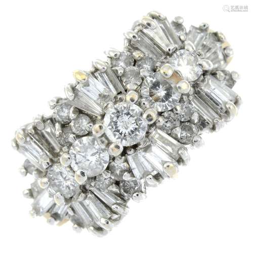 A vari-cut diamond dress ring.Estimated total diamond weight...