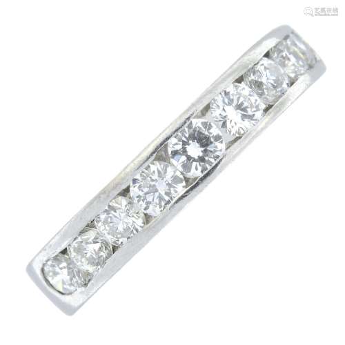A platinum brilliant-cut diamond half eternity ring.Estimate...