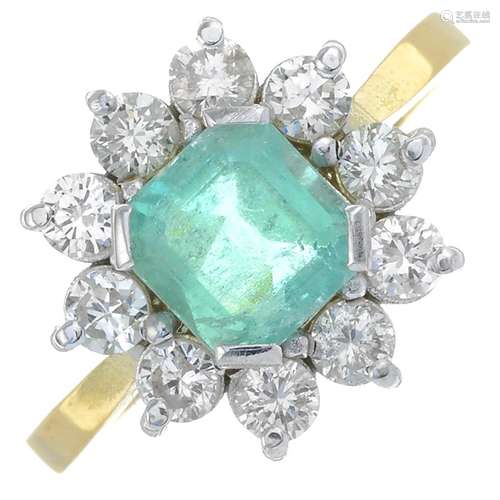 An emerald and brilliant-cut diamond cluster ring.Emerald ca...