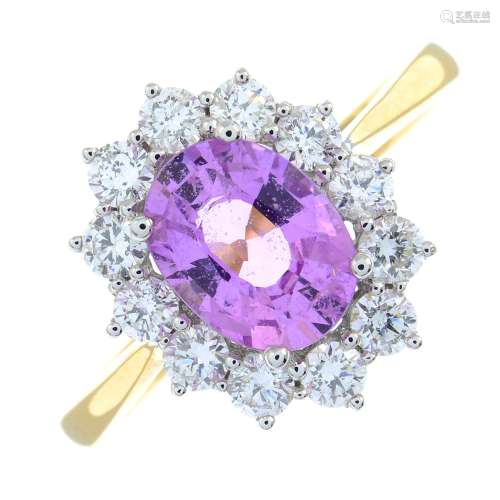 An 18ct gold pink sapphire and brilliant-cut diamond cluster...