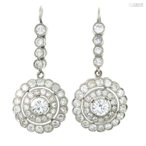 A pair of diamond cluster drop earrings.Estimated total diam...