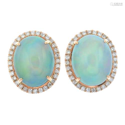 A pair of opal cabochon and brilliant-cut diamond cluster ea...