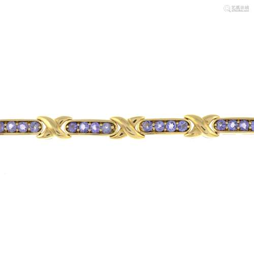 A 14ct gold tanzanite bracelet, with stylised 'x' spacers.