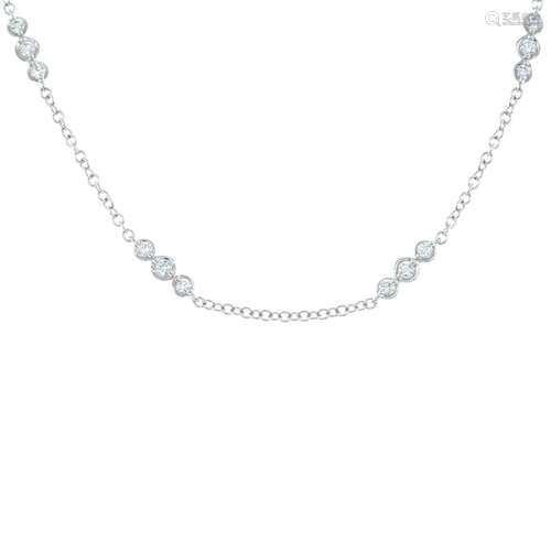 A brilliant-cut diamond necklace.Total diamond weight 0.32ct...