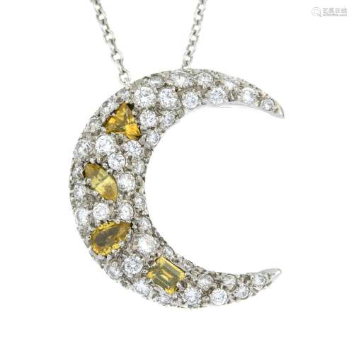 A yellow sapphire and brilliant-cut diamond crescent moon pe...