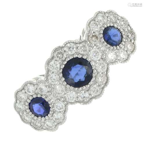 A sapphire and brilliant-cut diamond triple cluster ring.Tot...