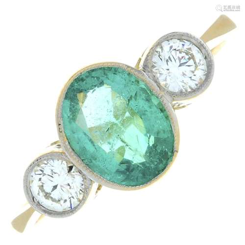 An 18ct gold emerald and brilliant-cut diamond three-stone r...