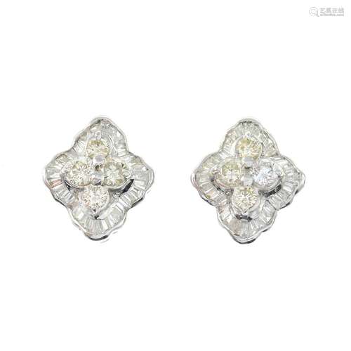 A pair of vari-cut diamond cluster earrings.Estimated total ...