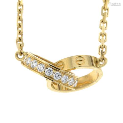 An 18ct gold brilliant-cut diamond 'Love' pendant,