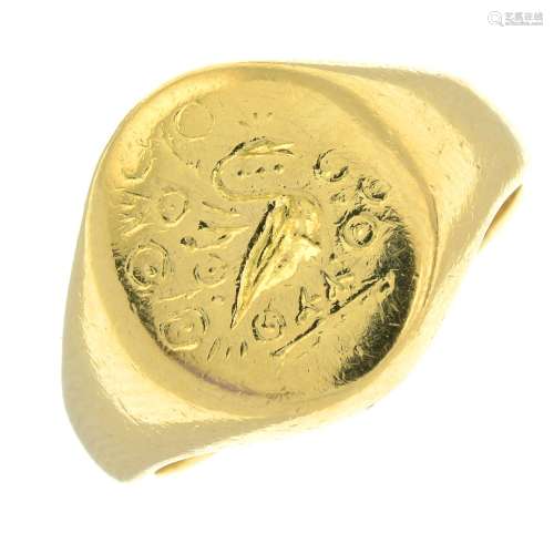 An 18ct gold oval-shape signet ring.Hallmarks for Edinburgh,...
