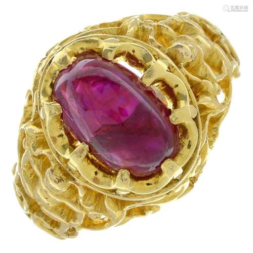 A Burmese ruby cabochon single-stone openwork ring.