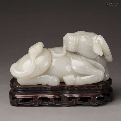 Pure white jade lying cow ornament