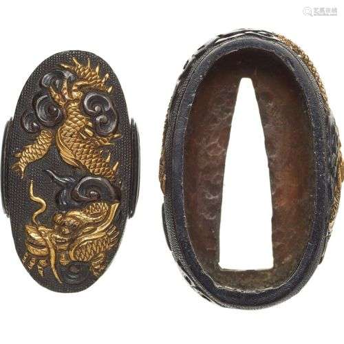 Fuchi kashira. Shakudô. Période Edo, XVIIe siècle. Signe : G...