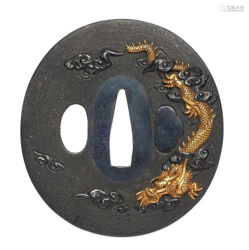 Tsuba. Shakudo. Va travailler. Période Edo, XVIIe siècle. Si...