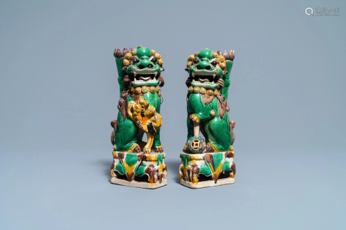 A pair of Chinese sancai-glazed biscuit Buddhist lion