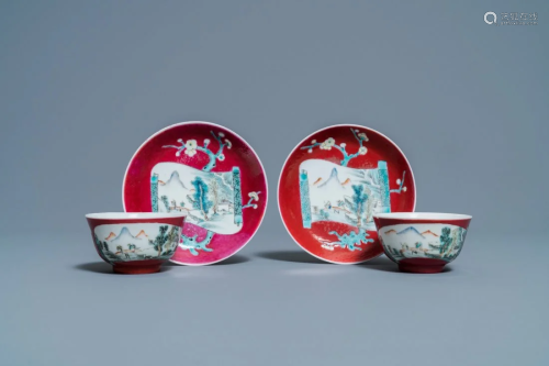 A pair of Chinese famille rose ruby-ground cups and