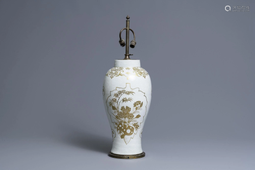 A Chinese parcel-gilt bianco-sopra-bianco vase mounted