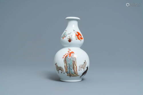 A Chinese polychrome double gourd vase with a goat