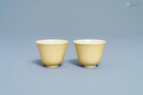 A pair of Chinese monochrome yellow wine cups, Kan…