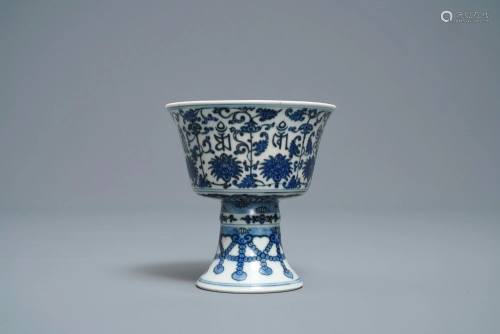A Chinese inscribed blue and white stem cup, Qianlong