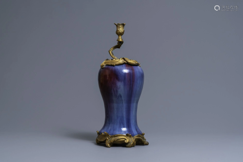 A Chinese flambe-glazed vase with gilt bronze