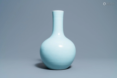 A Chinese monochrome clair de lune bottle vase with an
